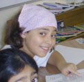 Smiles and schoolwork in Sara's classroom